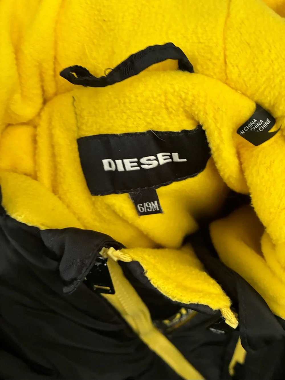 Diesel Black Jacket with Bright Yellow Lining